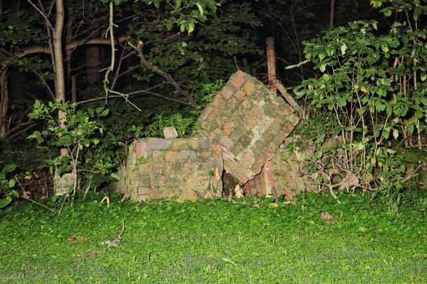 Here is a shot of that brick work.  Nature has definately taken it's toll to the point that one can hardly tell what it use to be.  Was it a Crypt?  Was it a care takers shed?  Was it something else?