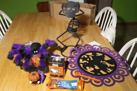 Of course, I had to do a shot of everythign that I got. As you will see, there's the skeleton, and the little Pumpkin Man, which Witchy painted herself. Great work and again, Thanks.