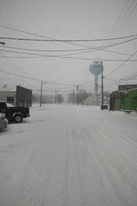 Just a few short months ago, that street was alive with people and carnival rides.  Now it could easily pass for a street in a ghost town