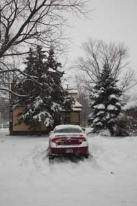 I tried to gas up my car that day, but it totaly bogged down in the snow by the end of my block.  I had to walk back to my house, get a shovel and dig a trench all the way back to my parking space.