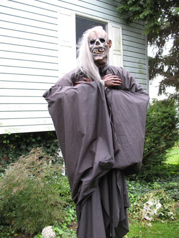 Third or fourth year for this guy; he's so tall, at night he's really freaky.  This one consistently scares the kiddies.